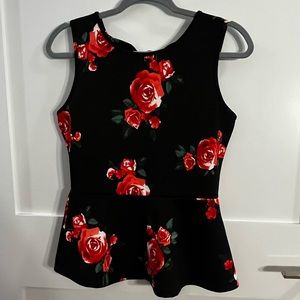 Peplum thick spandex material top with cutout in back size S/M womens